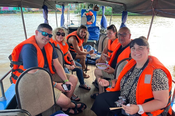 1-Day Cai Rang Floating Market-Biking & Cu Chi Tunnel Trip - Village Biking Between Waterways and Rice Paddies