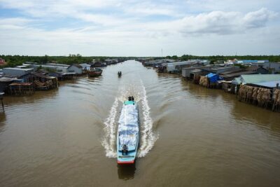 1-day Mekong Delta Tour: Cai Be Market, Local Island and Cycling - Cai Be Floating Market: seeing food trade up close