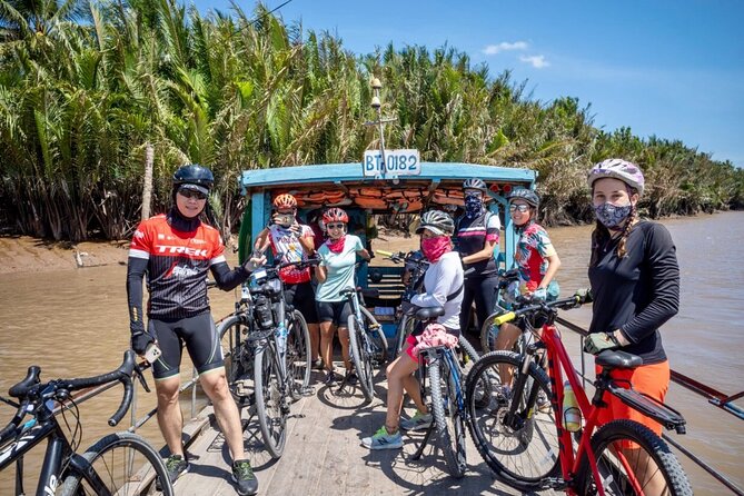 Bike And Boat Mekong Delta Cycling Tour - Tien Giang Province: elevated rice paddies, homes, coconut trees, and farm exploration