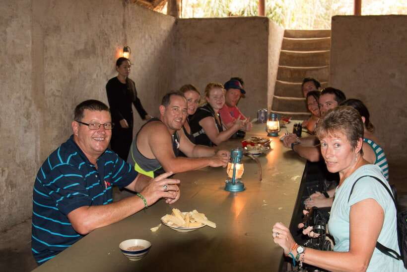 Cu Chi Tunnels Half-Day: Big Group Vietnam War Experience - District 1 pickup, 8:00 departure, and the Cu Chi drive