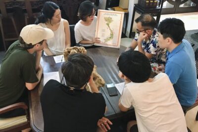 Discover Vietnam's Coffee Culture. - Inside the Café: Old Saigon Feel, Modern Conversation