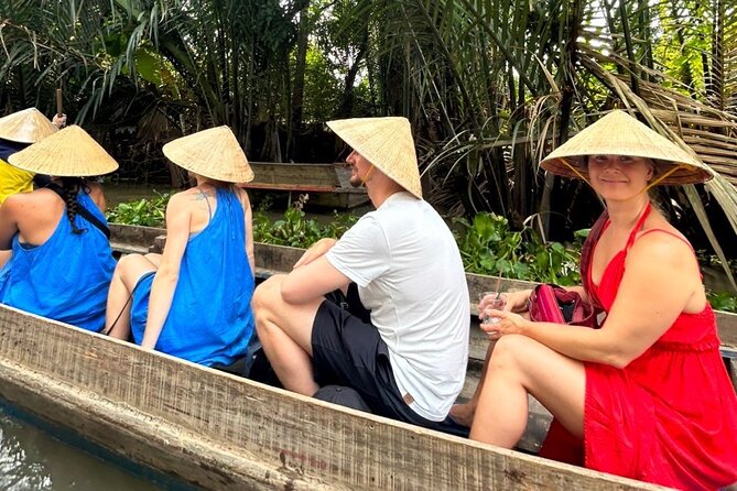 From HCM City: Mekong Delta Tour with Sampan Journey - Sampan ride through coconut-lined canals: the moment that feels most local