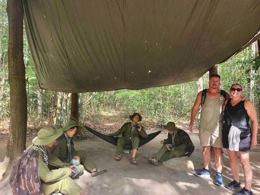 From Ho Chi Minh: Cu Chi Tunnels & Mekong Delta Full Day - Coconut candy, fruits, folk music, and honey tea: culture on a plate