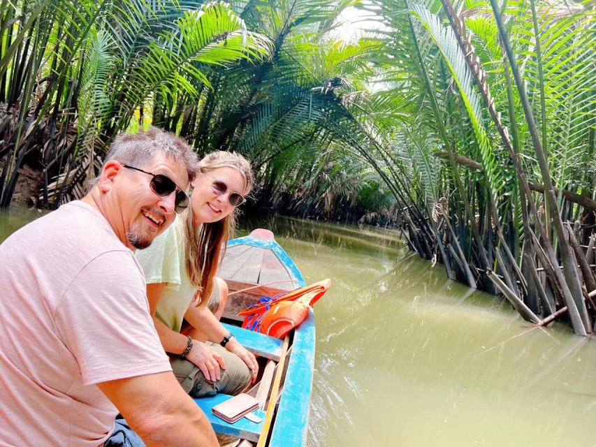 From Ho Chi Minh: Explore Mekong Delta & Vinh Trang Pagoda - Vinh Trang Pagoda: giant Buddha statues and a mixed design style