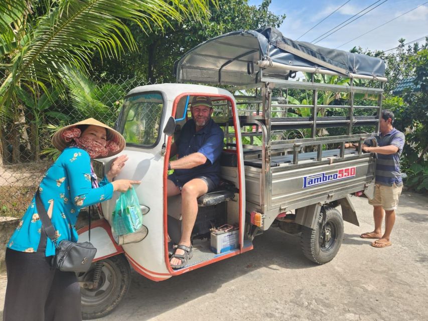 From Ho Chi Minh: Explore Mekong Delta & Vinh Trang Pagoda - Rowing through small canals, then tuk-tuk through village lanes