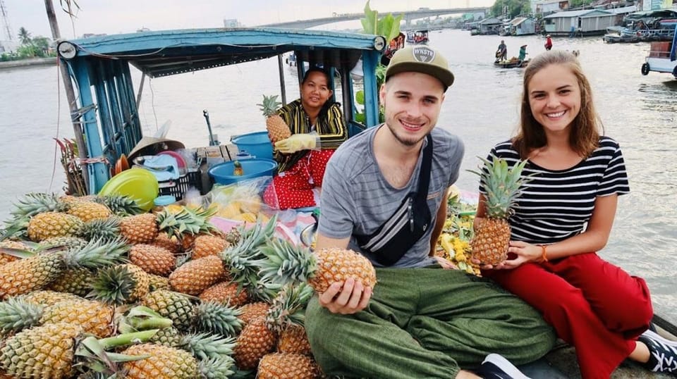 From Ho Chi Minh: Mekong Delta 3-day w Tra Su Forest - Xu Dua folk music and áo dài fruit service: entertainment with context