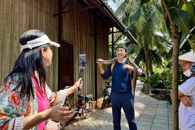 Full Day Guided Mekong Delta Day Tour in Vietnam (Multilingual) - Lunch, snacks, and bottled water: why this price works for real days