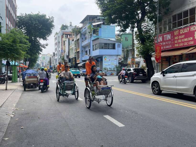 Ho Chi Minh City Sightseeing Panoramic Cycling Tour By Cyclo - Nguyễn Huệ Walking Street: where the tour turns from monuments to everyday Saigon