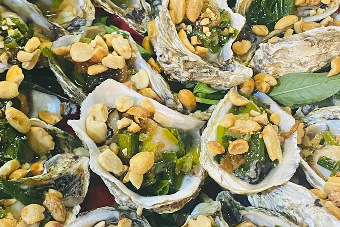 Ho Chi Minh City: Street Food & Sightseeing Tour with Local Guide - Stop-by-Stop: Monument to Markets and Apartment-Block Street Food