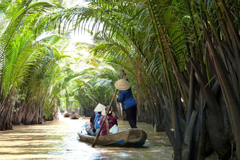 Ho Chi Minh Daily Tour: Full Day Mekong Delta (Private tour) - Hand-Rowing Sampan Through Overhanging Coconut Trees