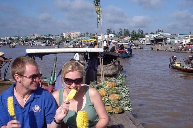 Ho Chi Minh Uncovered Cu Chi tunnels and Mekong Delta Tour - Ben Tre, the coconut kingdom: fruit farms, bikes, and a hand-rowed sampan