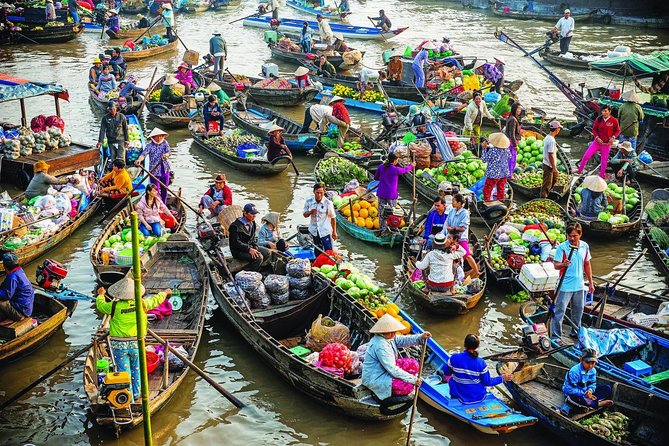 Luxury Mekong Delta Floating Market small Group 2 Days 1 Night - Day 1: My Tho and the Tiền River cruise (plus hand-rowed sampan time)