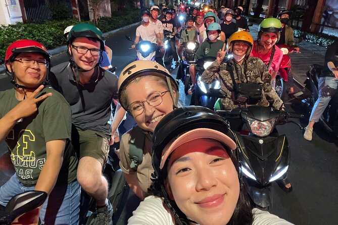 Private Discover Saigon Hidden Spots on Night Motorbike Adventure - District 10 food and beer moment: a simple, local snack break