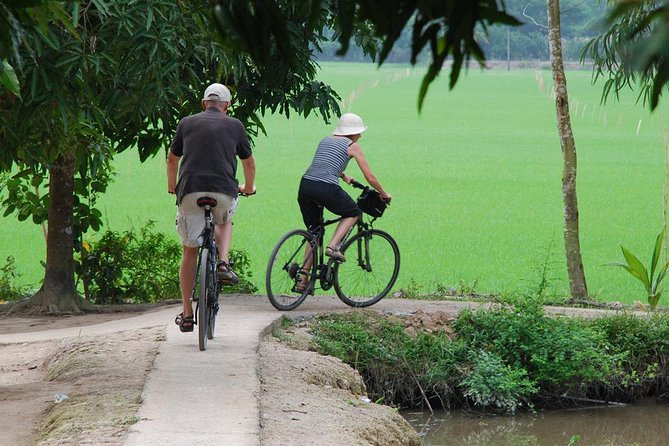 PRIVATE LUXURY Mekong 1 Day with Biking, Fishing, Cooking Class & BBQ LUNCH - Unicorn Island: stilted fishing houses, fruit, and handmade treats