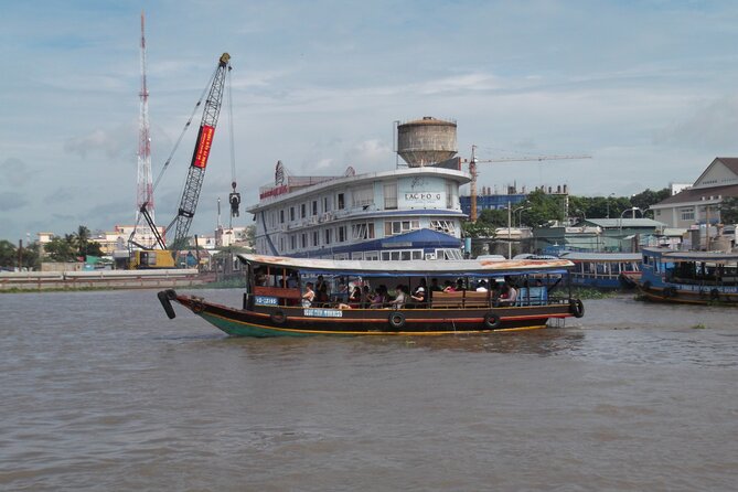 Private Mekong Delta Less Tourist - Coconut Island Tour - Ben Tre canal ride through Tan Thach: the quiet middle of the day