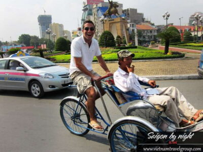 Saigon by Night: Traditional Dinner Cruise - Cyclo through District 1: Ben Thanh, City Hall, and the real pace of Saigon