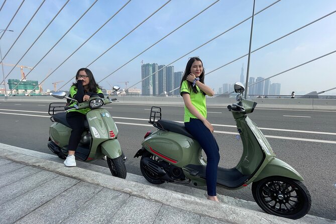 Saigon Morning and Afternoon Adventure by Vespa - Dragon Harbor and the modern-versus-riverside contrast