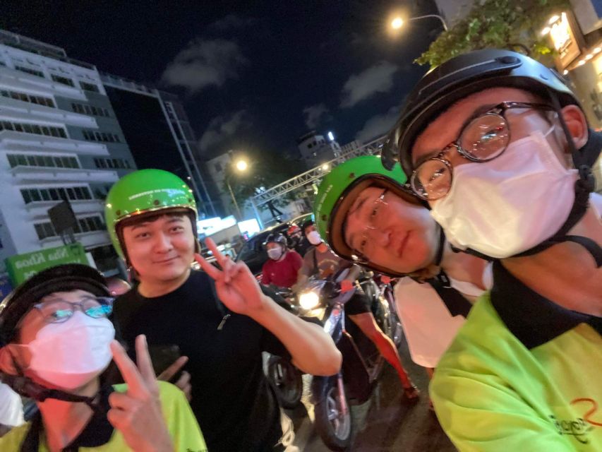 Saigon: Night Sightseeing And Street Food Tour By Vespa - The seafood finale: snails, seafood variety, and beer