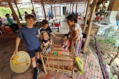 SMALL GROUP - Mekong Delta 1 Day Tour with Lunch - Vinh Trang Pagoda: a calm break with bronze and old-world layers
