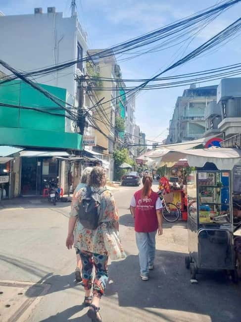 Top Saigon Unique Street Food On Scooter w/ Locals - Flower Market and Temple Time: Nuoc Mia and Tra Da Stops